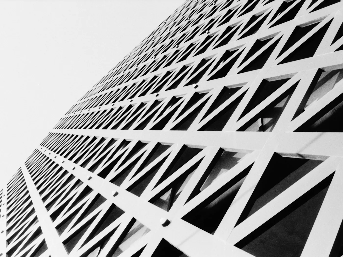 Geometric architectural facade pattern seen from below