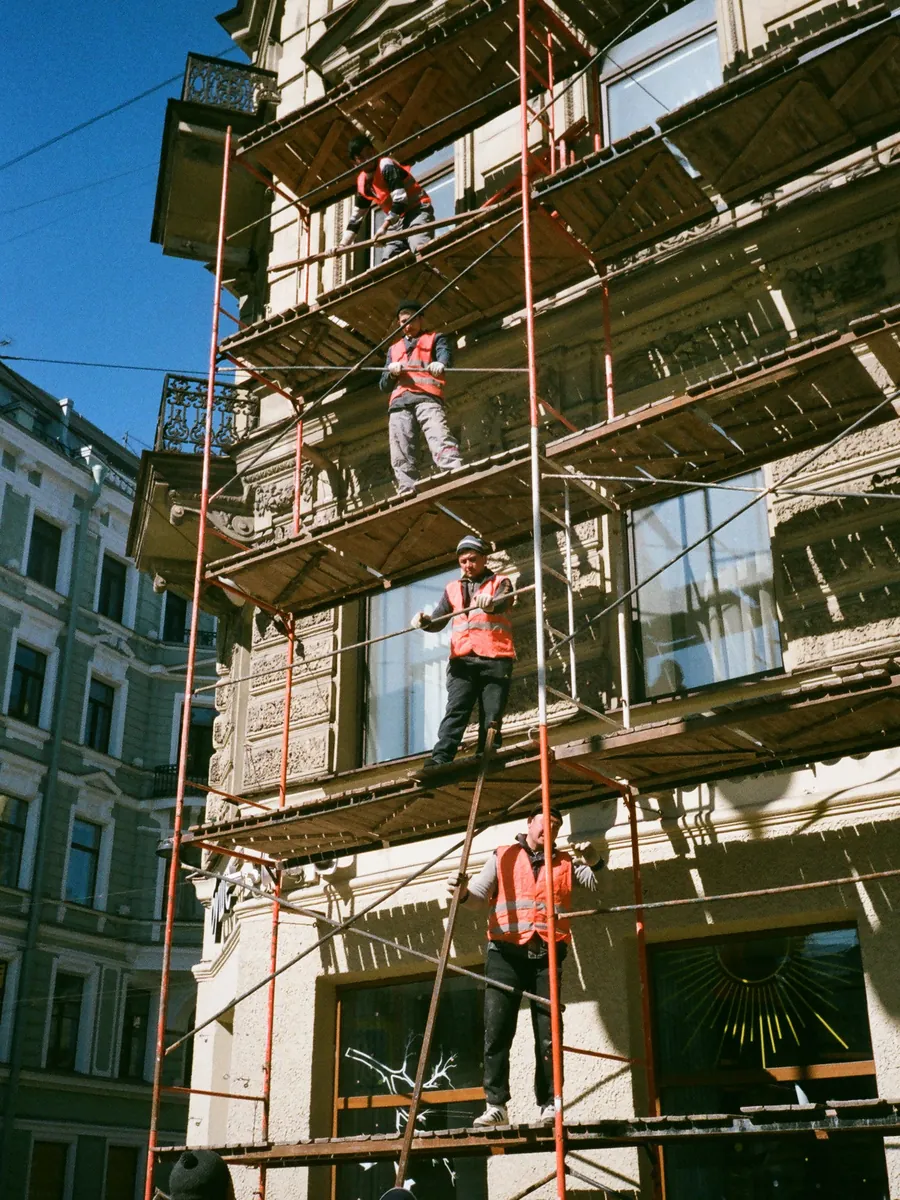 Crew working from scaffolding on a building